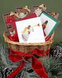 Quilled Christmas Angel Greeting Card in basket with other Quilled gifts wrapped in red bow on green background