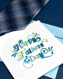 Quilled Happy Father's Day Card with light blue envelope next to blue tie and navy blue background