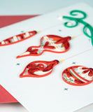 Close up detail shot of Quilled Red Christmas Ornaments Greeting Card.