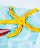 close up detail of quilled starfish greeting card
