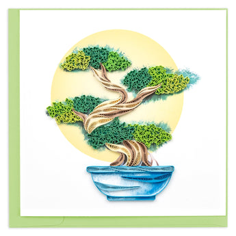 Blank greeting card of a quilled bonsai tree in a blue pot