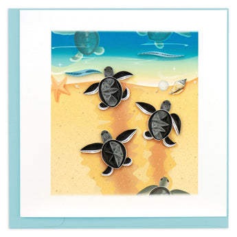 Blank greeting card of three quilled sea turtle babies crawling through the sand to the ocean