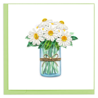 yellow daisies, green leaves, mason jar