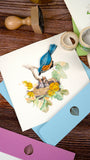  Quilled Bluebird & Babies Greeting Card with blue envelope on wooden table