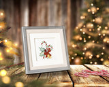 Quilled Candy Canes Christmas Card in silver frame on table with candy canes in front of christmas tree