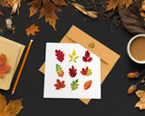 Quilled Fall Foliage Leaves Greeting Card on dark background surrounded by leaves an autumn decor