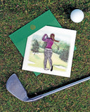 Quilled Female Golfer Greeting Card laying flat on grass surface with a golf club and a golf ball.