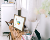 Quilled Floral Rainbow Heart Greeting Card in frame on kitchen counter