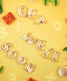 close up detail of quilled get will soup greeting card