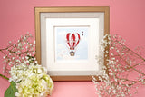 Quilled Heart Air Balloon Greeting Card in golden frame on pick background behind white flowers