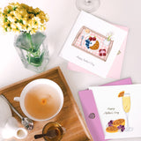 Quilled Mother's Day Breakfast in Bed Greeting Card on table next to breakfast tray and vase with flowers