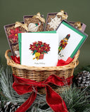 Quilled Potted Poinsettia Holiday Card in holiday basket with other quilled products in front of green background