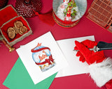 Quilled Snow Globe Christmas Card sitting on a red backdrop with Santa beginning to write a letter.