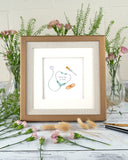 Quilled Thank You Healthcare Greeting Card framed in a Golden Square sized Artist Series Frame, on a white wooden surface, surrounded by pink flower vases, and cattails.