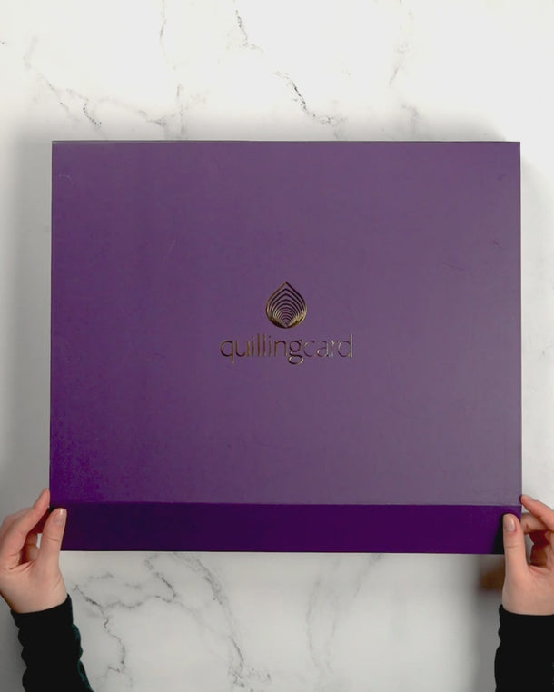 Quilled Art-size Artist Series Lady in Gold being removed from luxury gift box, details, placed on bookshelf