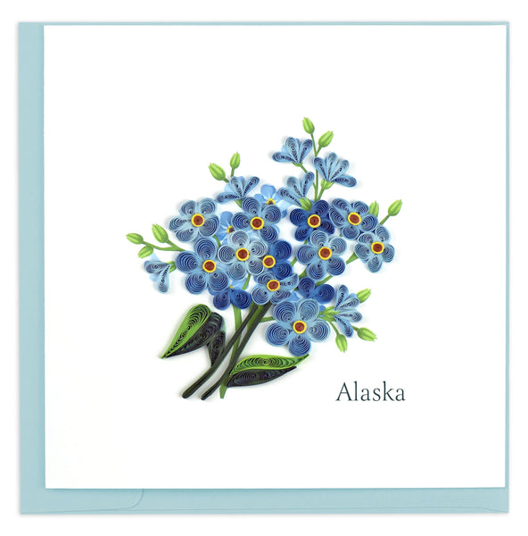 Greeting card featuring a quilled design of foreget-me-not flowers