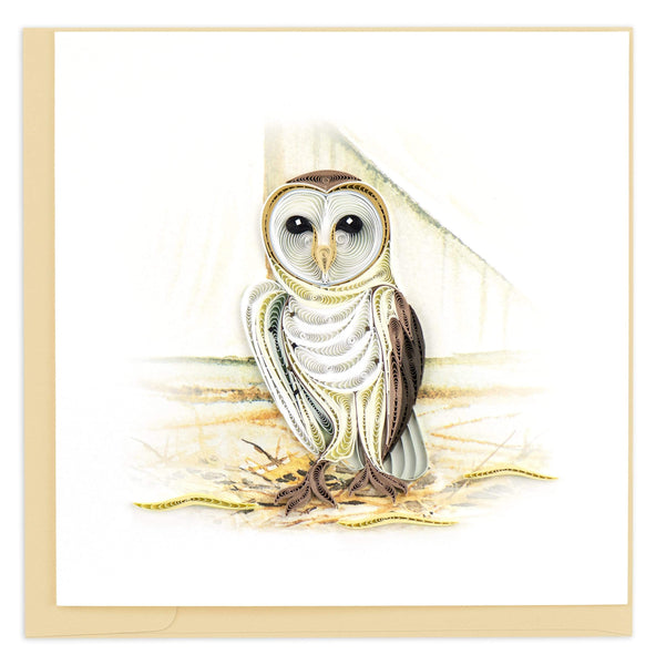 Blank quilled greeting card of a cream and brown barn owl standing on a hay covered barn floor