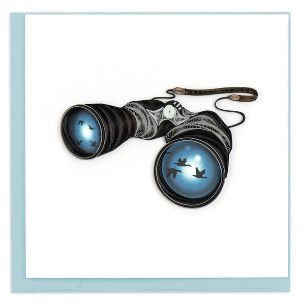 Quilled blank greeting card of a pair of binoculars with flocking geese reflected in the lenses