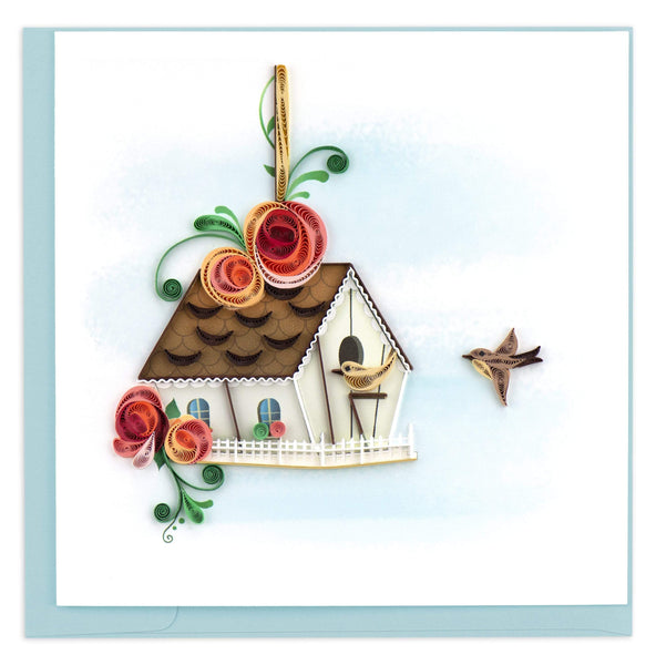 Quilled blank card of a birdhouse with orange and pink flowers and two birds.