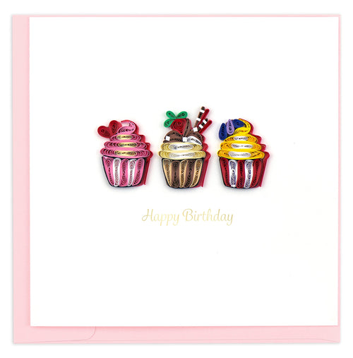 Three cupcakes with candles in pink, red and yellow, with the text Happy Birthday underneath.