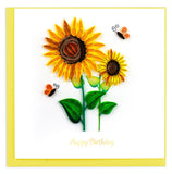 Two yellow sunflowers and butterflies, reading Happy Birthday at the bottom of the card.