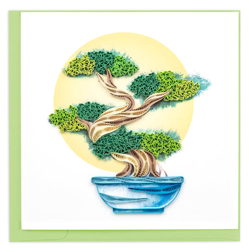 Blank greeting card of a quilled bonsai tree in a blue pot