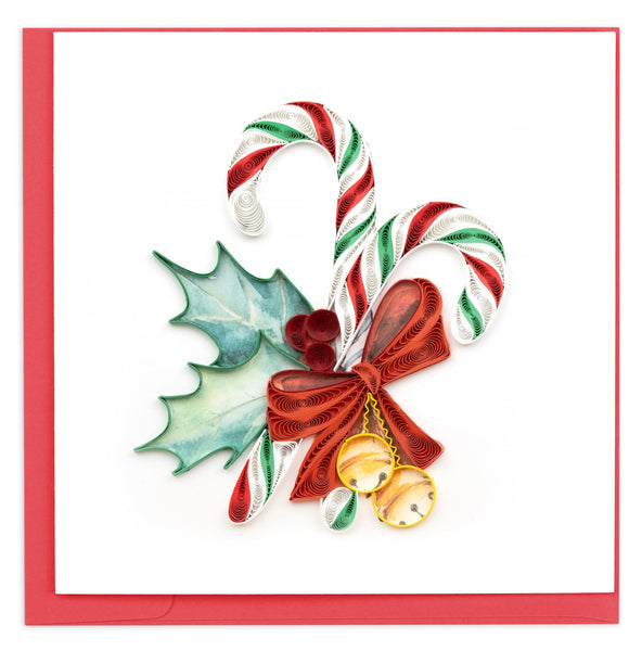 candy canes, red bow, bells, holly