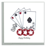 Poker chips and playing cards in black and red.