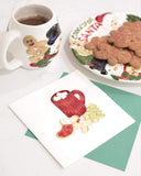 Quilled Christmas Cookies card on counter next to plate of cookies and mug of hot coco