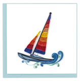 A sailboat with rainbow sails on rolling blue waves.