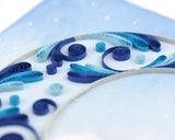 Detail shot of a quilled crescent moon greeting card