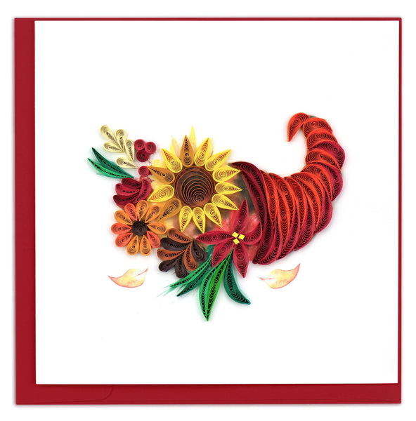 handcrafted card showing an orange cornucopia filled with seasonal florals