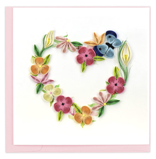 Blank quilled card of a floral heart made of springy flowers.
