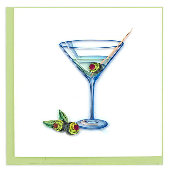 A martini in a glass with an olive and a toothpick sticking out.