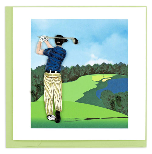 A golfer in a blue shirt teeing off down a green fairway.