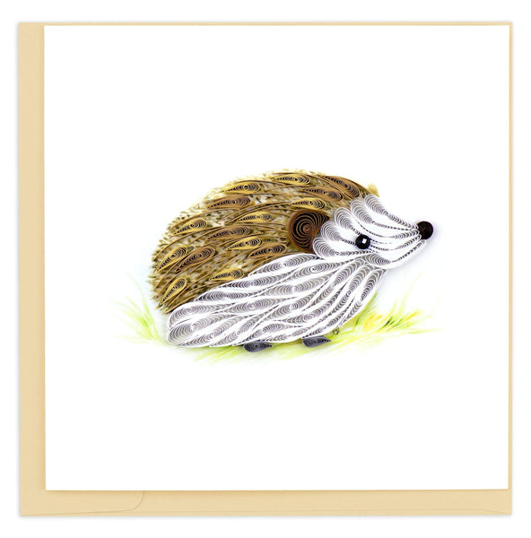 A hedgehog with white fur, brown spikes, and a smiling face.