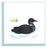 Greeting card featuring a quilled design of a black loon gliding through the water