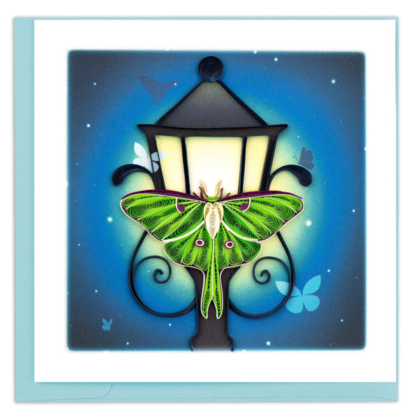 Blank greeting card featuring a quilled green Luna Moth perched on lamp post at dusk