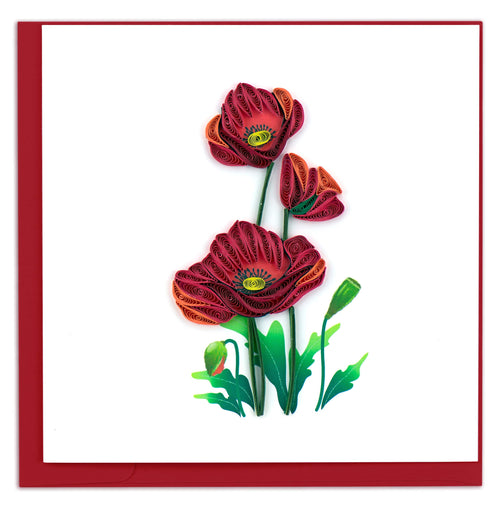 Three quilled red poppy flowers with yellow centers