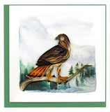 Blank greeting card of a red-tailed hawk perched on a branch in front of a watercolor wilderness background
