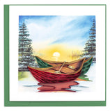 Blank greeting card of one red and one green river canoe on a wintery watercolor background at sunset