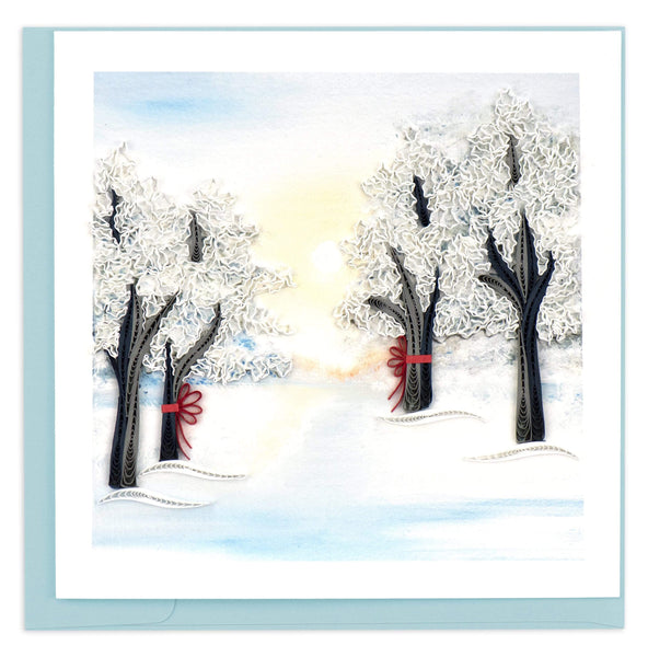 Blank quilled card with four snow covered trees.