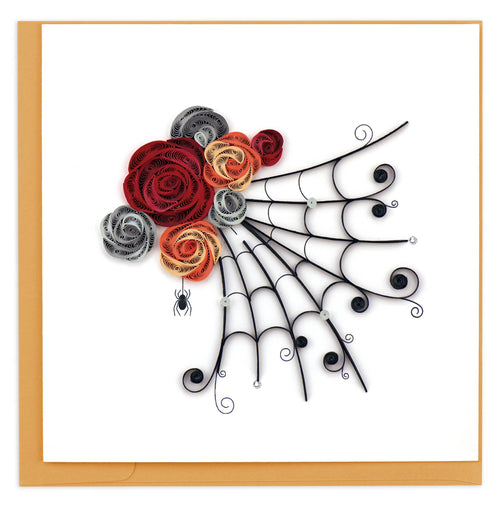 Blank greeting card of a quilled spider's web emerging from orange, red and gray flowers.