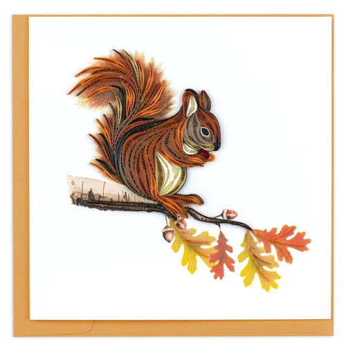 Blank greeting card of quilled squirrel perched on a branch with autumn leaves