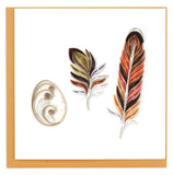 Blank Quilled card showing an egg, baby bird feather and adult bird feather