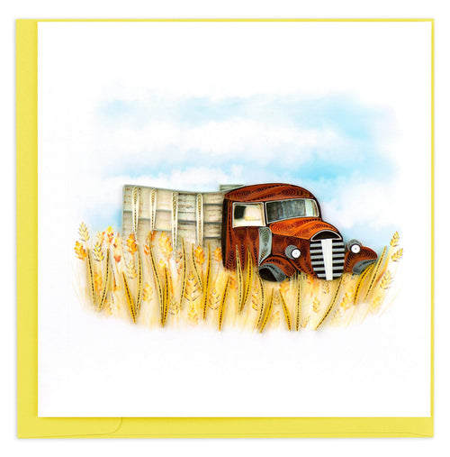 Blank Greeting Card of a burnt orange farm truck in yellow wheat field