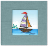 Sticky note pad cover featuring a quilled design of a sailboat